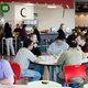 Google employees and contractors fill the cafeteria at Google Kirkland in 2009.